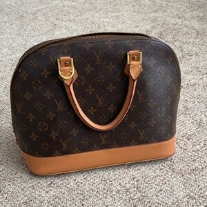 Flawed Louis Vuitton Brown and Tan Satchel